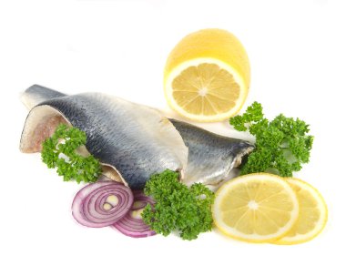 Herring with herbs and lemon clipart