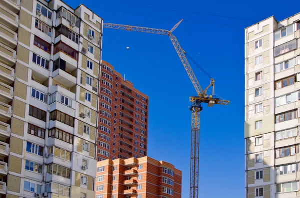 Stock image New building and crane