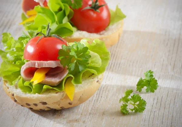 Stock image Sandwiches with ham, lettuce and tomato