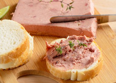 Liver pate and slices of bread clipart