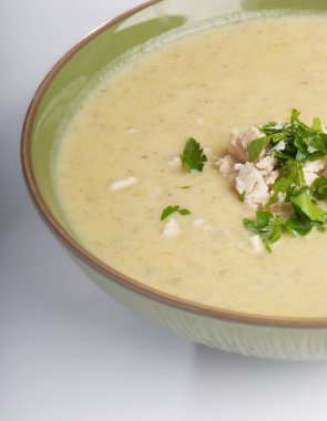 Creamy soup with parsley clipart