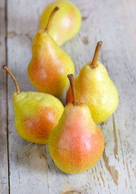 Pears on a wooden table clipart