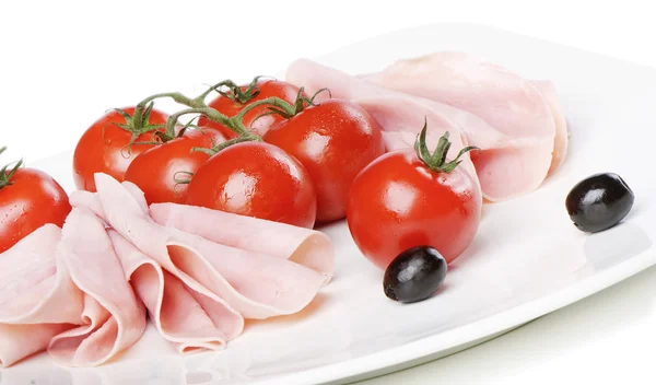 Slices of ham and tomatoes — Stock Photo, Image