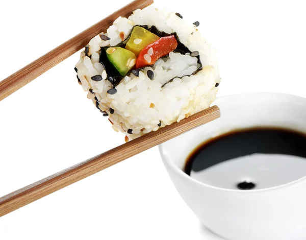 Sushi on chopstick — Stock Photo, Image