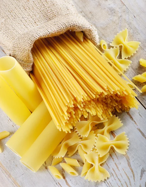 stock image Italian pasta on a wooden table