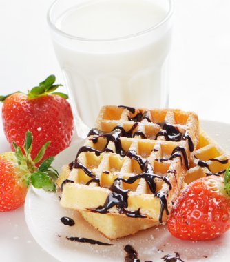 Waffles with berries and milk clipart