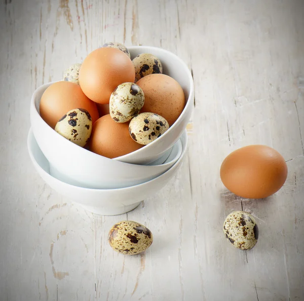 stock image Eggs on a wooden table