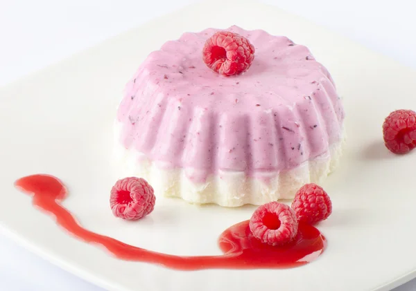 Raspberry dessert with cream — Stock Photo, Image