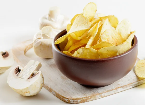 Potato chips with mushrooms — Stock Photo, Image