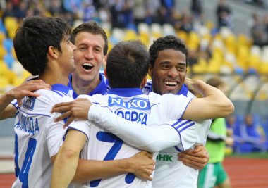 FC Dynamo Kyiv players celebrate after scored a goal clipart