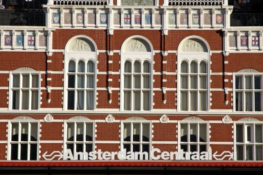 Facade of building of Central Railway Station in Amsterdam clipart