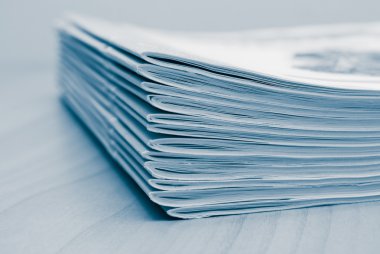 Stack of white journals clipart