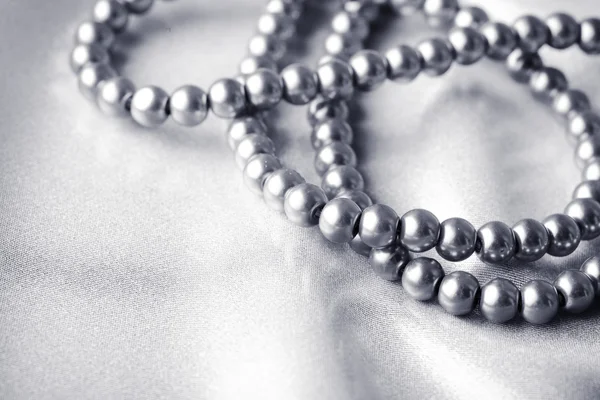 Beads on silk — Stock Photo, Image
