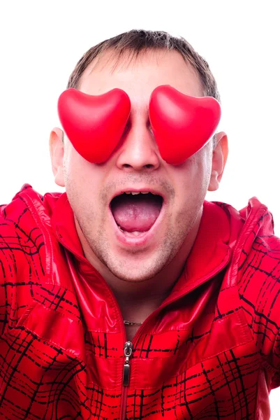 Hombre con formas rojas del corazón — Foto de Stock