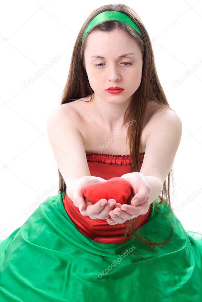 Woman with heart in hand sad