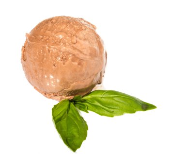 Scoop of chocolate ice cream with mint leaf clipart