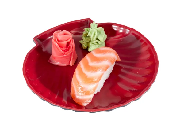 Estudio rodaje de sushi japonés vaki con salmón sobre fondo blanco —  Fotos de Stock