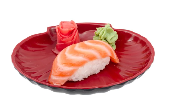 Estudio rodaje de sushi japonés vaki con salmón sobre fondo blanco — Foto de Stock