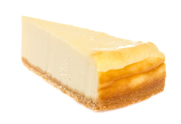 白地に隔離されたチーズケーキ — ストック写真