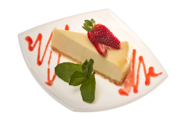 stock image A piece of strawberry cheesecake on whit