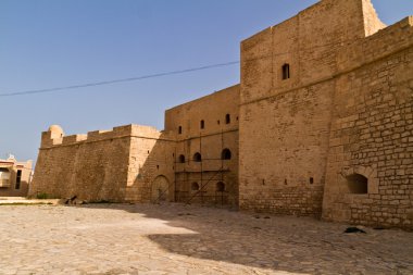 Ribat - arabic fortification and cemetery in Mahdia - seaside to clipart