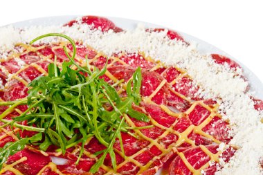 Et (biftek) ile Parmesan peyniri ve ruccola Carpaccio