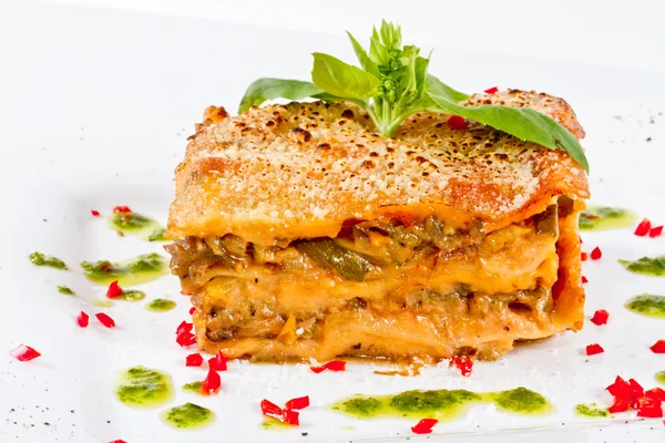 stock image Closeup of lasagna and basil fork