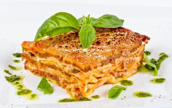 stock image Closeup of lasagna and basil fork