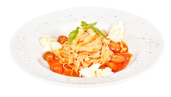 Pasta (tagliatelle) with cherry tomato and mozzarella — Stock Photo, Image