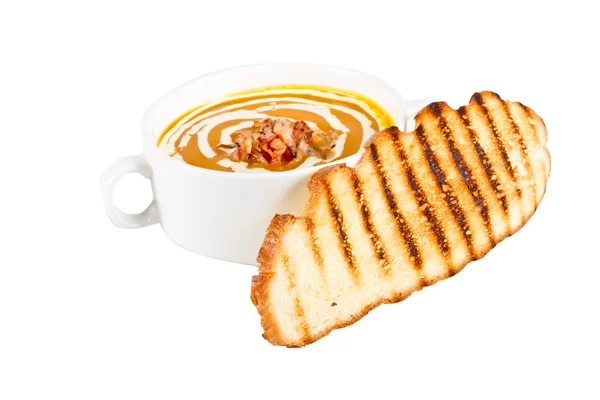 Pumpkin soup with bacon and dread — Stock Photo, Image