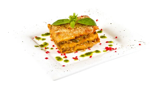 stock image Closeup of lasagna and basil fork