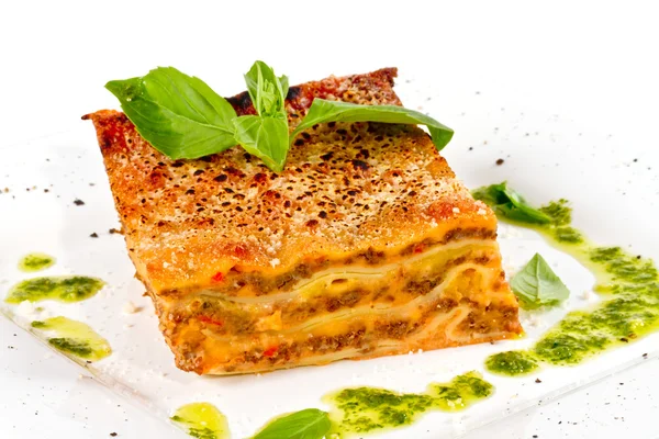 stock image Closeup of lasagna and basil fork