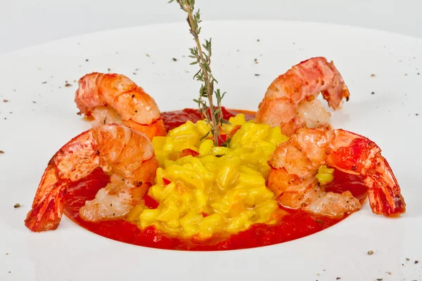 stock image Plate of Shrimps Risotto garnished with fresh parsley and Parmes