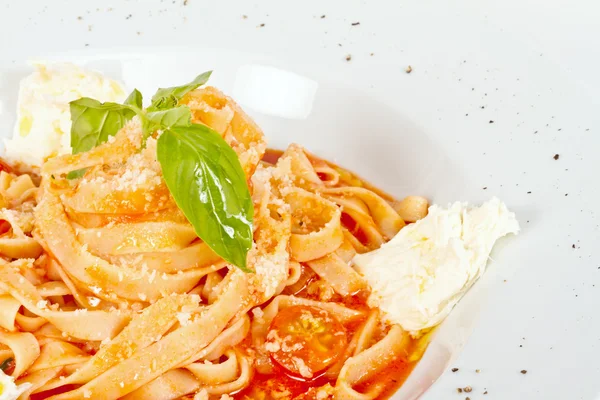 stock image Pasta (tagliatelle) with cherry tomato and mozzarella