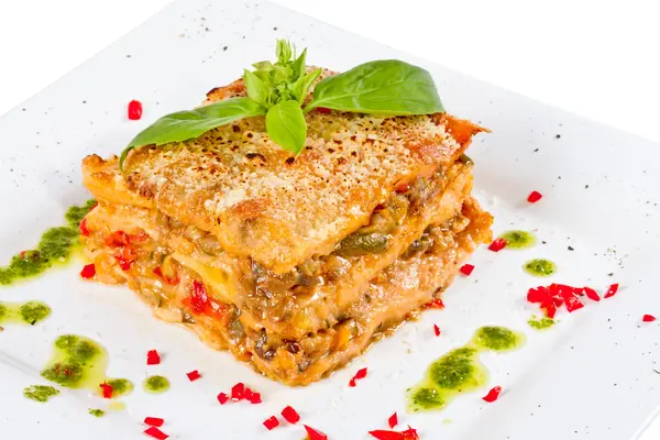 stock image Closeup of lasagna and basil fork