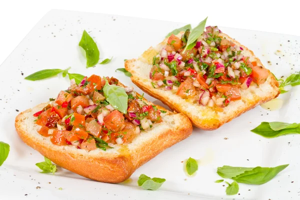 (Włoski tosty czosnek chleb) bruschetta z pomidorami — Zdjęcie stockowe