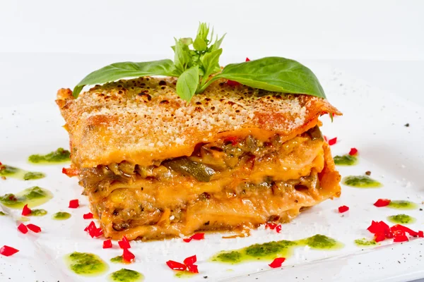 stock image Closeup of lasagna and basil fork