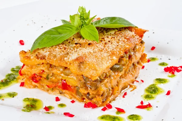 stock image Closeup of lasagna and basil fork