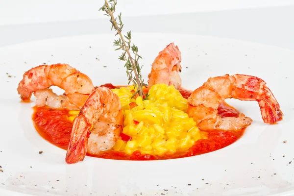 stock image Plate of Shrimps Risotto garnished with fresh parsley and Parmes