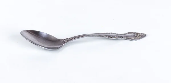 Spoon and white plate — Stock Photo, Image