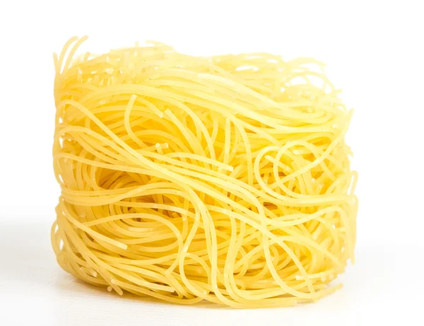 Una porción de pasta italiana tagliatelle aislada en blanco —  Fotos de Stock