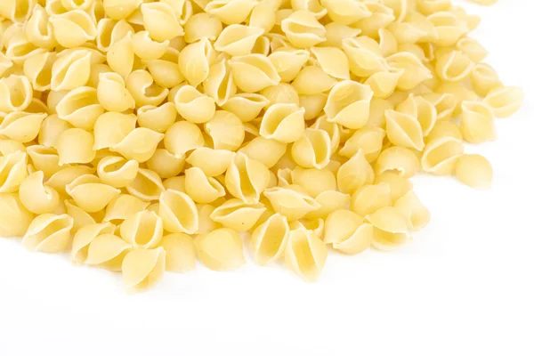 stock image Heap of raw pasta (conchiglie)