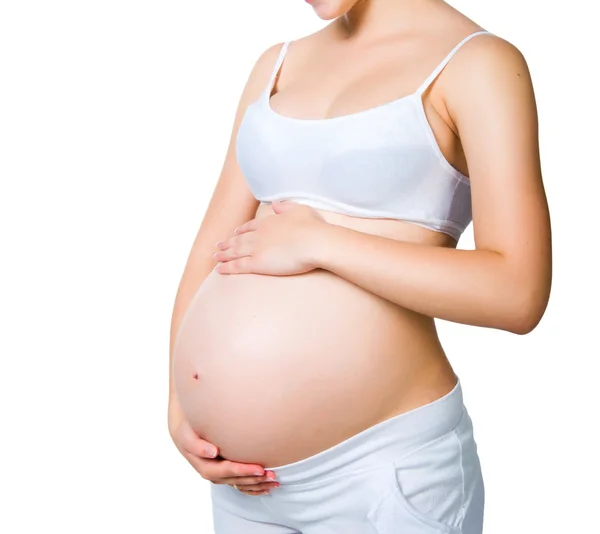 Femme enceinte tenant tirelire — Photo