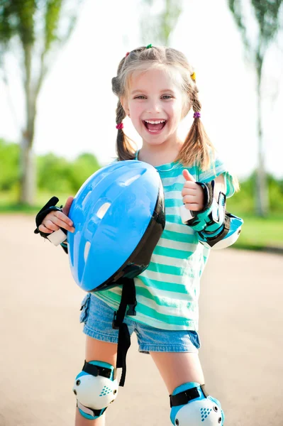 Little girl in roller skates — Stock Photo, Image