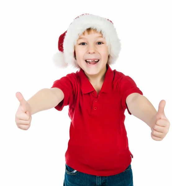 Menino no chapéu de Papai Noel — Fotografia de Stock