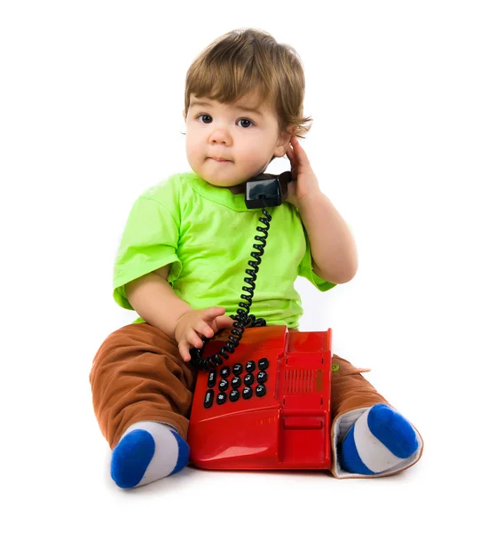 Маленький хлопчик з телефоном — стокове фото