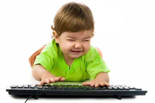 Anak kecil memegang keyboard — Stok Foto