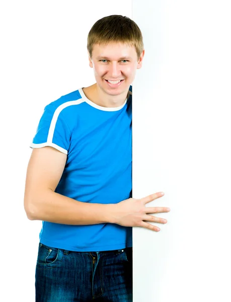 Adam boş Reklam panosunun arkasına ayakta — Stok fotoğraf
