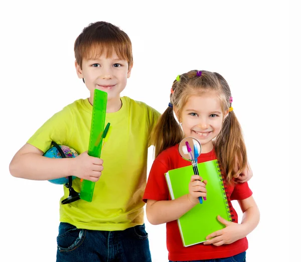Niños con cuaderno y globo —  Fotos de Stock