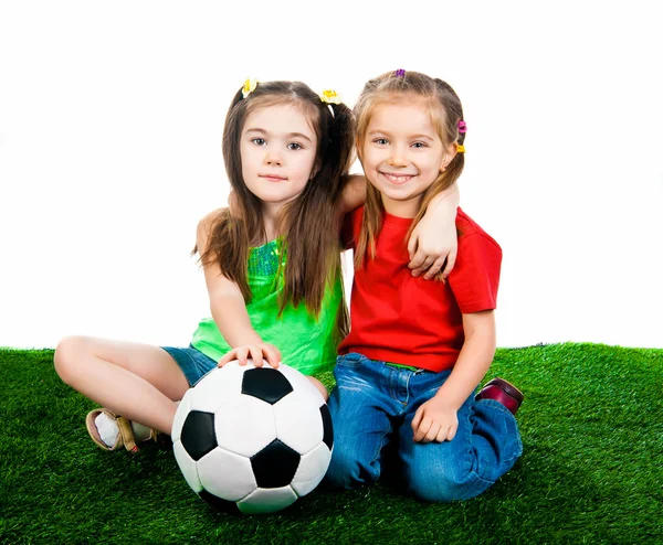 Malé děti s fotbalovým míčem — Stock fotografie